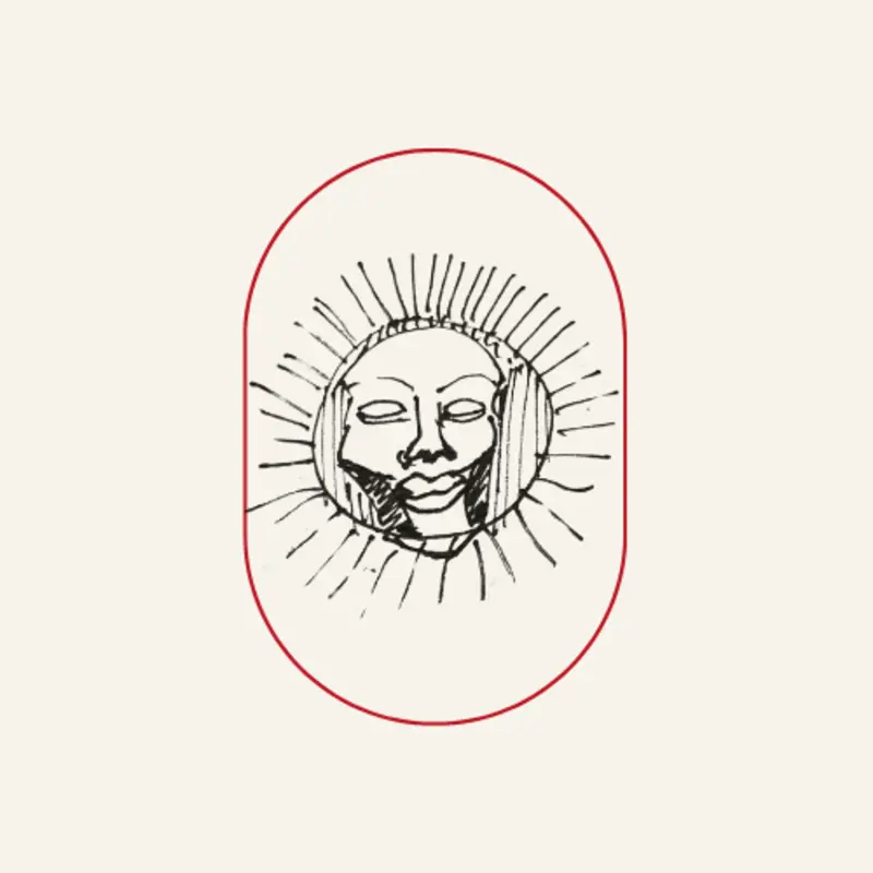 Dessin d'un visage-soleil aux rayons tracés à la plume